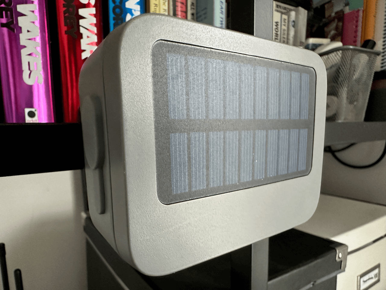 RAKwireless Unity Solar node mounted on my bookshelf